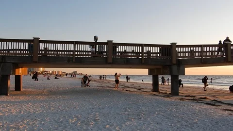 Left To Right Pan People Walking On Pier Bridge At Beach Resort To Photograp Stock Footage 127250152