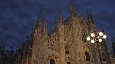 Left to right pan real time medium shot of a Milan Cathedral. A popular tourist Stock Footage 122287803