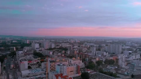 Left to right pan of Sunset Aerial view social housing buildings Stade de Video stock 130311560