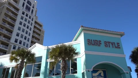 Left To Right Pan Surf Style Shop  To Open Blue Sky Stock Footage 127375249