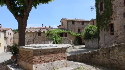 Left right pan view of a beautiful italian square in Rocca D'Orcia Stock Footage 80150753