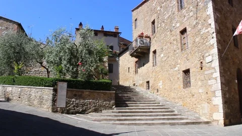 Left-Right pan view of a medieval quaint street in Tuscany countryside, Siena Stock Footage 97870154
