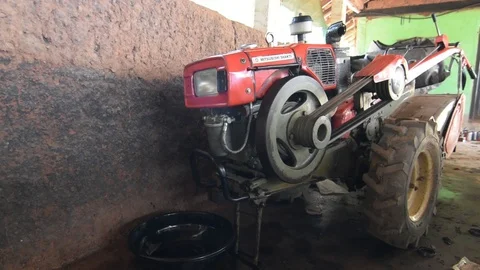 Left to right panning shot of broken cultivator in an indian farm 스톡 동영상 90425177