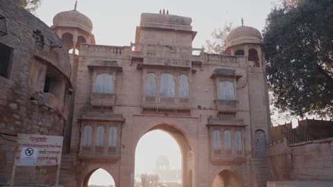 Left to Right panning shot of heritage gate of gadisar lake jaisalmer rajasthan Stock Footage 282791304