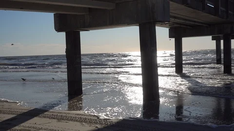 Left To Right Panorama Underneath Bridge Pier Dock On Ocean At Sunset 스톡 동영상 127780476
