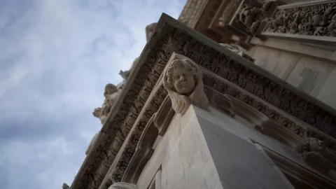 Left to right real time close up shot of a Milan Cathedral. A popular tourist Stock Footage 122288314