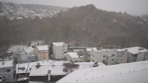 Left to Right Rooftop Pan of Snowy Mlinovi Neighborhood, Zagreb Stock Footage 321619173
