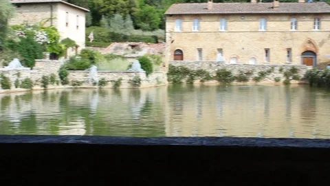 Left-Right  View, of the thermal bath in the square of Bagno Vignoni Stock-Footage 99154678
