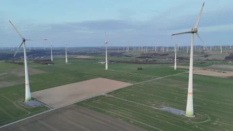 Left to right view with twin turbines and distant rows Stock Footage 331214441