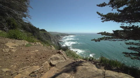 Left rolling dolly shot above Big Sur coast Stock Footage 62625660