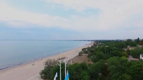 On the left is the sea, on the right are thick trees, and in the center is the Stock Footage 133015413