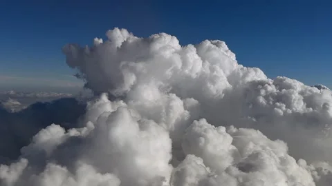 Left Side Aerial View of Threatening Storm Clouds Through the Cockpit’s Stock Footage 318056375