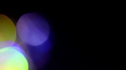 The left side of the bokeh light shines with beautiful colors. Video stock 309426849