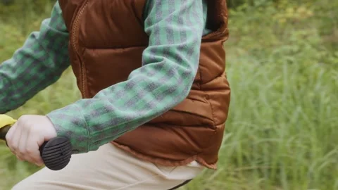 Left side close up of child hands on handlebar Stock Footage 316581341