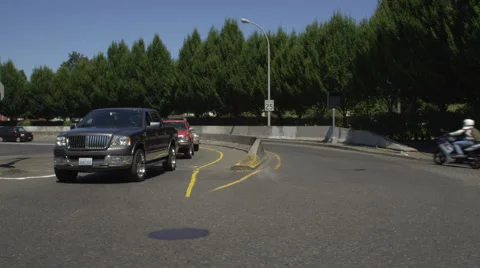Left Side view of a Driving Plate: Car turns left out of Legacy Emanuel Hospital Stock Footage 59308587