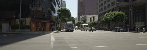 Left Side view of a Driving Plate: Car turns right onto Figueroa Street in Los Stock Footage 59338318