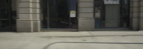 Left Side view of a Driving Plate: Car travels on Spring Street in Los Angeles, Stock Footage 59354777