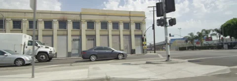 Left Side view of a Driving Plate: Car travels on 8th Street in Los Angeles Stock Footage 59361211