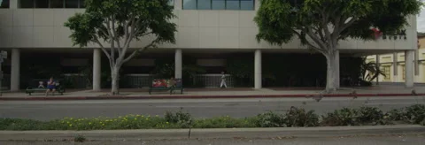 Left Side view of a Driving Plate: Car travels on Wilshire Boulevard in Los Stock Footage 59376889