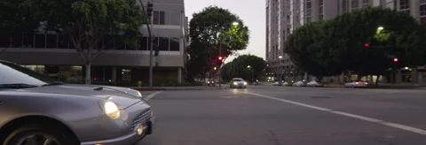 Left Side view of a Driving Plate: Car turns right from Figueroa Street in Los Stock Footage 59439758
