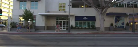 Left Side view of a Driving Plate: Car travels on 2nd Street in Santa Monica, Stock Footage 59506974