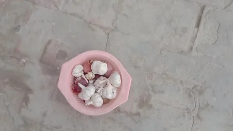 Left Side View of Garlic and Onions in Basket Video stock 347248686
