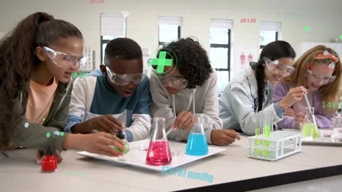 Left student squeezing dropper, group mixing flasks and tubes, observing color Stock Footage 332701560