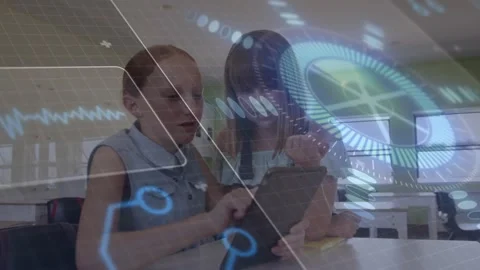 Left student tapping tablet and activating HUD, peer pointing and editing Stock Footage 332285454
