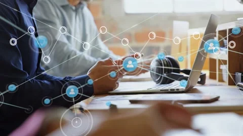Left worker tapping phone while second frame starting network map, icons linking Stock Footage 331062771