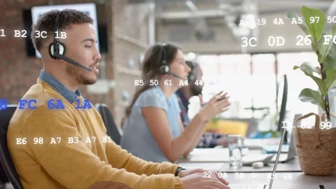 Leftmost male support agent answering call, typing for support as hex codes Stock Footage 333894006