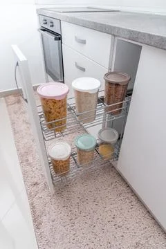 Leftover ingredients organized in clear reusable containers inside door rack Stock Photos