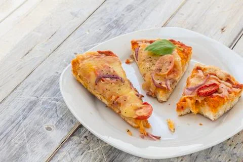 Leftover pizza Stock Photos