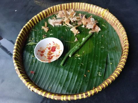 Leftovers from the fried fish menu. Stock Photos