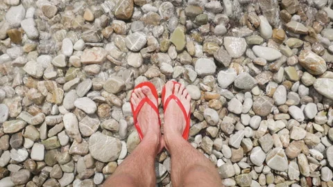 Leg of man stand on the beach Stock Footage 85863871
