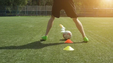 Leg skill training on football field. Soccer player running in football field Stock Footage 93665918