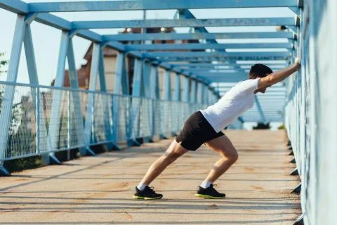 Leg stretching Stock Photos