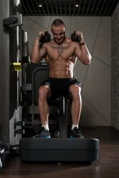 Leg Workout On Machine Stock Photos