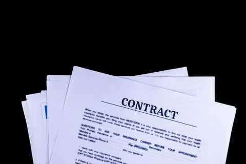 Legal Contract Agreement Documents Papers with black background and top view, Stock Photos