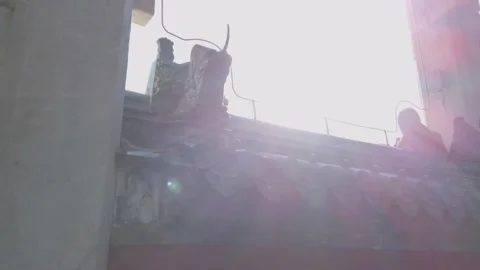 Legendary beast on eave of wall around altar of Sun in Ritan Park,Beijing,China Stock Footage 141505565