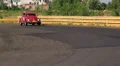 Legendary Volkswagen Beetle in vintage sport cars racing rally. Red colored HD Footage