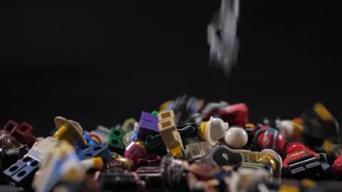 lego figures toys falling down 4k | Stock Video | Pond5