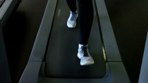 Legs and treadmill Stock Footage 75409776
