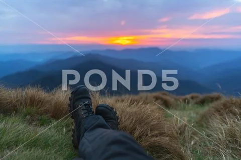 The legs on the beautiful mountain landscape background Stock Photos