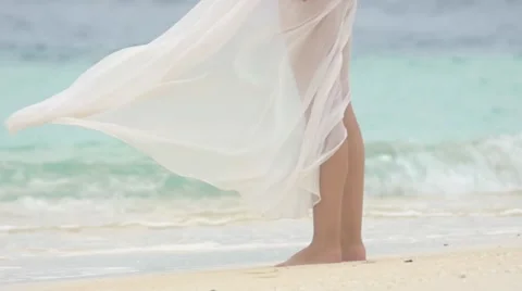 Legs of an beautiful woman walking on the sandy Maldives beach. Slow motion. 動画素材 49017953