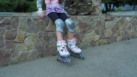 The legs of the child in the rollers. Stock Footage 78025292
