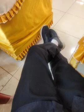 Legs crossed Stock Photos