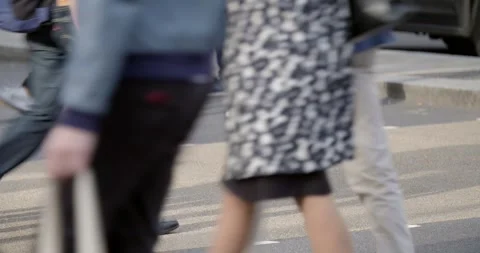 Legs of a Crowd Crossing the Road Stock Footage 220172097
