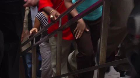 Legs of crowd emerging from NYC subway station Stock Footage 59454688