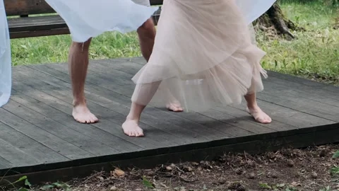 Legs of a dancing couple close up	 Stock Footage 309496913