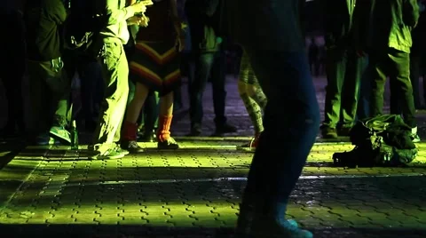 Legs of dancing crowds on reggae concert people having fun and relaxing Stock Footage 54582835